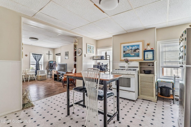 462-470 2nd Ave, Troy, NY 12182 - dining area with a drop ceiling, light flooring, an office area, and a wainscoted wall
