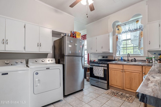 462-470 2nd Ave, Troy, NY 12182 - kitchen with appliances with stainless steel finishes, separate washer and dryer, crown molding, light tile patterned floors, and ceiling fan