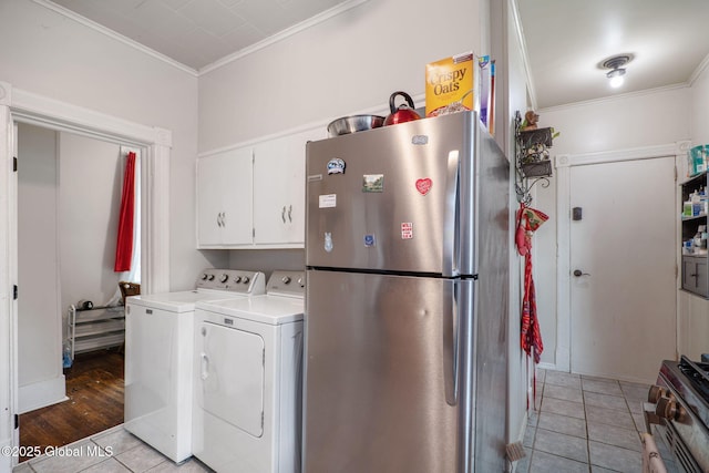 462-470 2nd Ave, Troy, NY 12182 - laundry room with crown molding, independent washer and dryer, and light tile patterned floors
