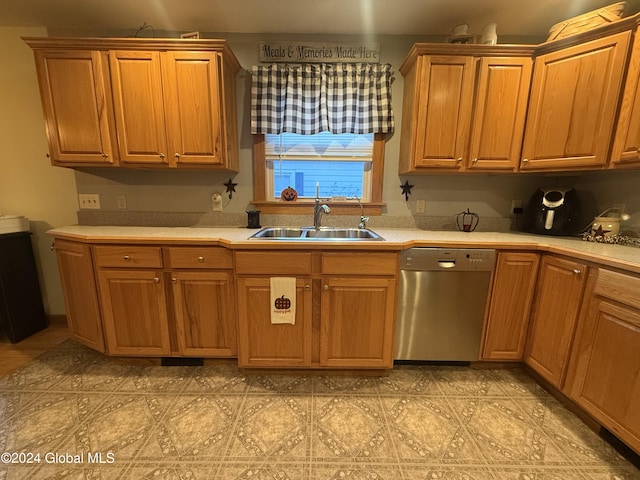 31 Wilson Ave, South Glens Falls, NY 12803 - kitchen featuring stainless steel dishwasher, light countertops, and brown cabinets