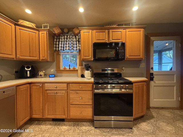 31 Wilson Ave, South Glens Falls, NY 12803 - kitchen with appliances with stainless steel finishes, light countertops, plenty of natural light, and recessed lighting