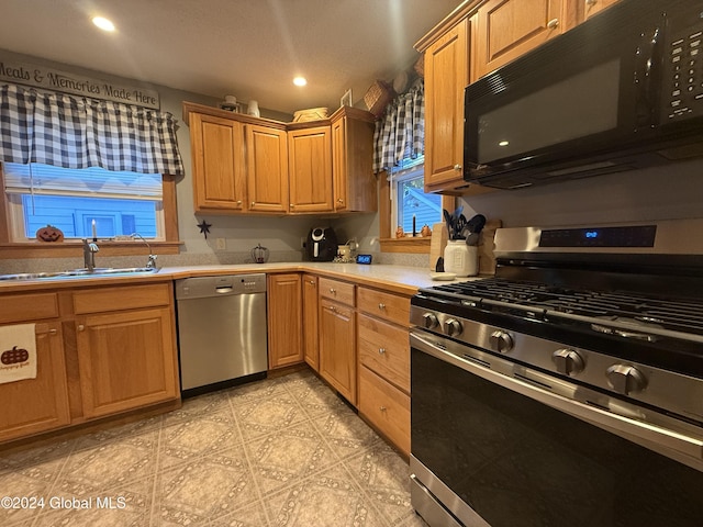 31 Wilson Ave, South Glens Falls, NY 12803 - kitchen with stainless steel appliances, light countertops, and recessed lighting
