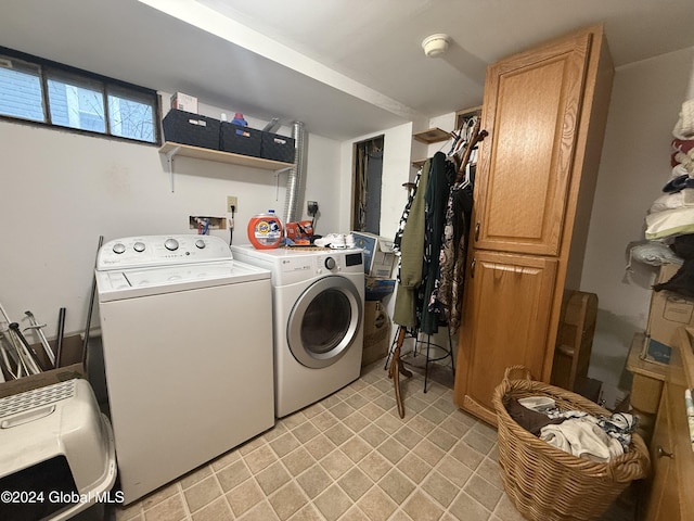 31 Wilson Ave, South Glens Falls, NY 12803 - laundry area featuring washer and clothes dryer and cabinet space