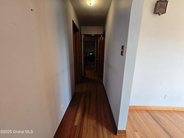 1335 Midline Rd, Amsterdam, NY 12010 - hallway featuring washer / dryer and wood finished floors