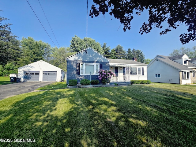 1335 Midline Rd, Amsterdam, NY 12010 - view of front of home featuring a detached garage, an outdoor structure, and a front yard