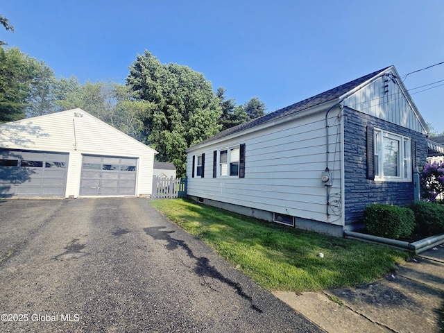 1335 Midline Rd, Amsterdam, NY 12010 - view of side of home featuring an outbuilding and a detached garage