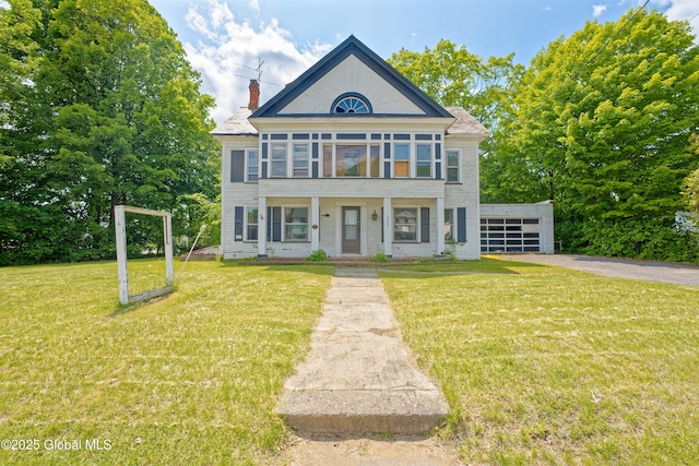 3885 Main St, Warrensburg, NY 12885 - view of front of property with a front yard, a chimney, and a porch