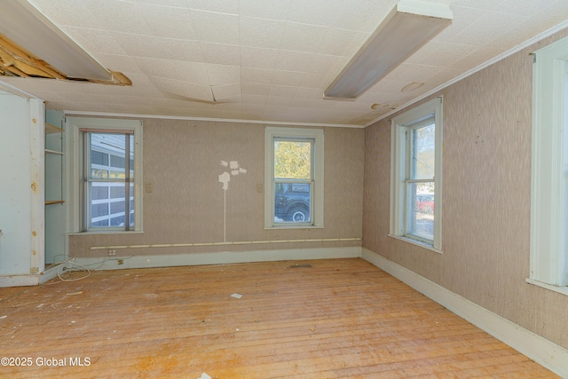 3885 Main St, Warrensburg, NY 12885 - empty room with wood finished floors and crown molding