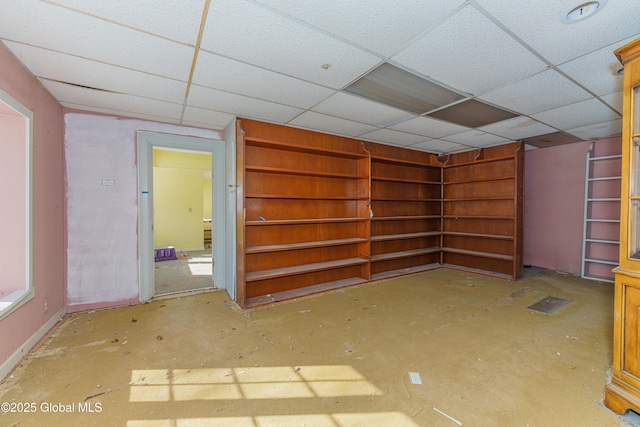 3885 Main St, Warrensburg, NY 12885 - below grade area with a drop ceiling and baseboards