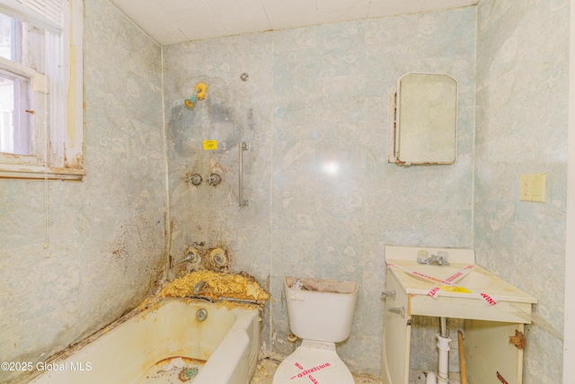 3885 Main St, Warrensburg, NY 12885 - bathroom featuring a tub and toilet