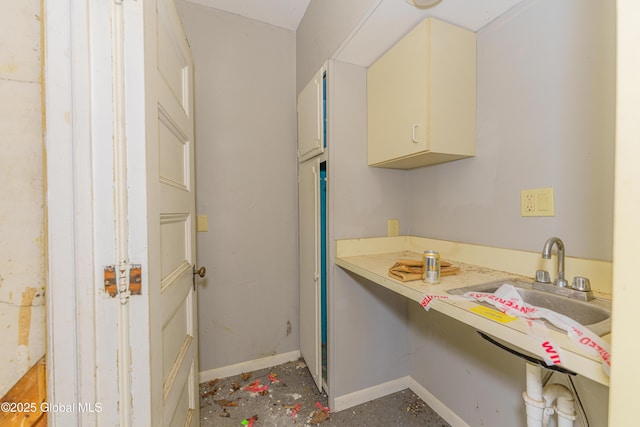 3885 Main St, Warrensburg, NY 12885 - bathroom with baseboards and a sink