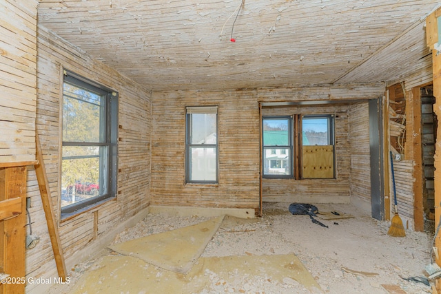 3885 Main St, Warrensburg, NY 12885 - spare room featuring healthy amount of natural light and wooden ceiling