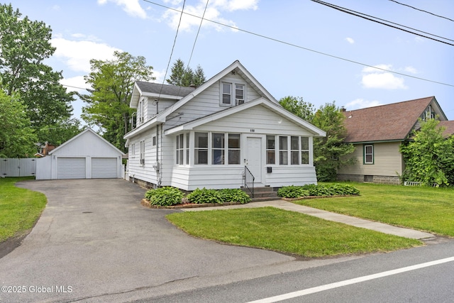 210 E Campbell Rd, Rotterdam, NY 12303 - view of front of property with a detached garage, an outdoor structure, entry steps, and a front yard