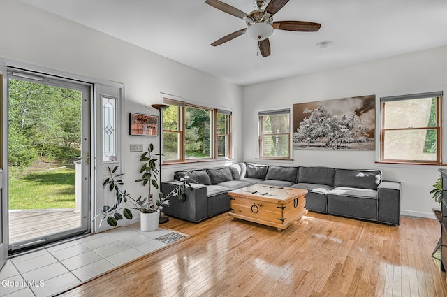 108 La Flamme Rd, Providence, NY 12850 - living room featuring a ceiling fan and light wood-style flooring