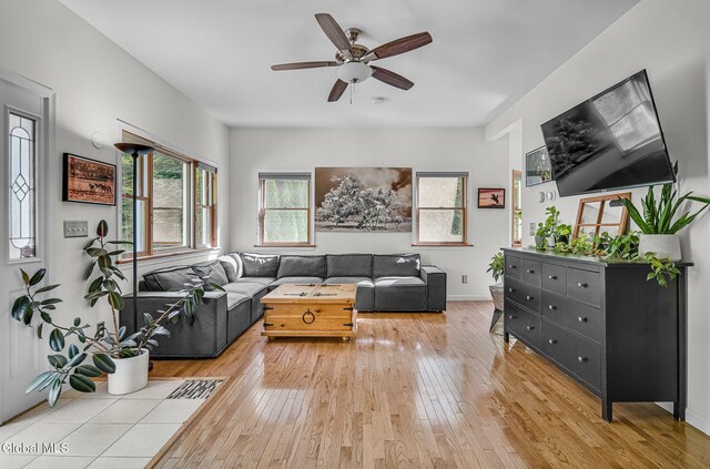 108 La Flamme Rd, Providence, NY 12850 - living area featuring light wood-style floors and a ceiling fan