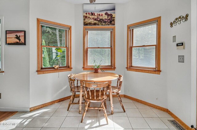 108 La Flamme Rd, Providence, NY 12850 - dining area with baseboards and light tile patterned floors