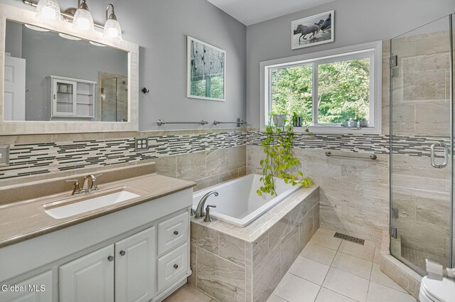 108 La Flamme Rd, Providence, NY 12850 - full bath with vanity, a bath, a shower stall, and tile patterned floors