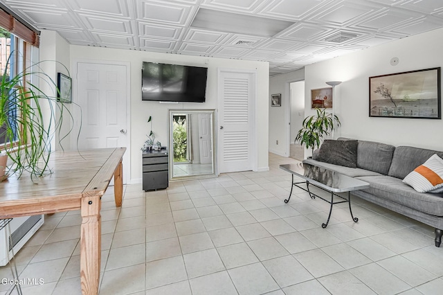 108 La Flamme Rd, Providence, NY 12850 - living room featuring an ornate ceiling and light tile patterned flooring