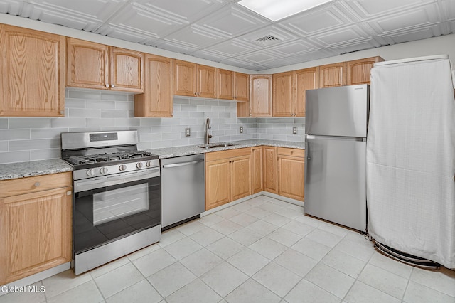 108 La Flamme Rd, Providence, NY 12850 - kitchen with appliances with stainless steel finishes, decorative backsplash, light stone counters, an ornate ceiling, and light tile patterned flooring