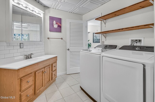 108 La Flamme Rd, Providence, NY 12850 - laundry room featuring washing machine and dryer and light tile patterned floors