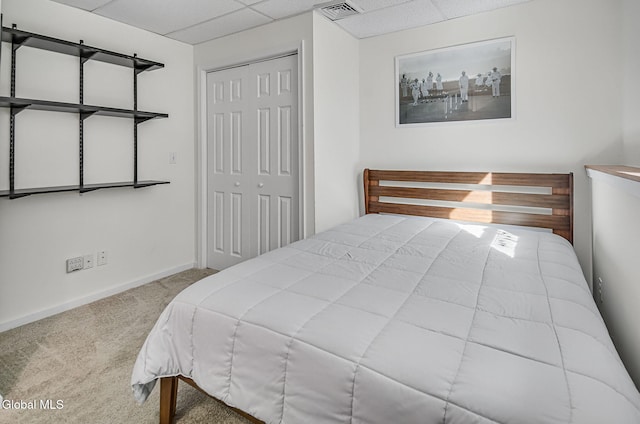 108 La Flamme Rd, Providence, NY 12850 - carpeted bedroom featuring a paneled ceiling and a closet