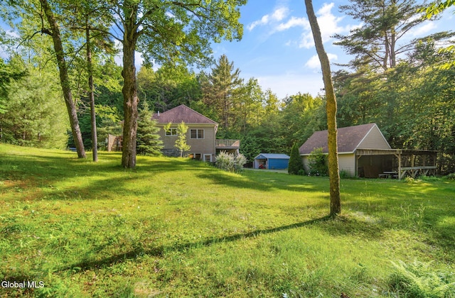 108 La Flamme Rd, Providence, NY 12850 - view of green lawn featuring an outbuilding