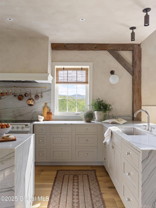 1174 Potter Mountain Rd, Gilboa, NY 12076 - kitchen with light stone countertops, light wood-style floors, electric stove, and recessed lighting
