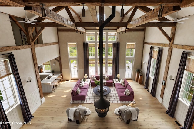 1174 Potter Mountain Rd, Gilboa, NY 12076 - dining space featuring a ceiling fan, high vaulted ceiling, beam ceiling, french doors, and light wood-style flooring