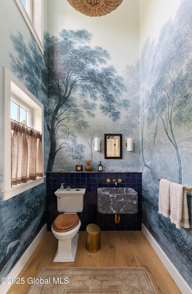 1174 Potter Mountain Rd, Gilboa, NY 12076 - bathroom with wood finished floors, wallpapered walls, and tile walls