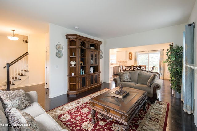 24 Utica Ave, Colonie, NY 12110 - living area with stairs and dark wood-type flooring
