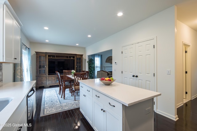 24 Utica Ave, Colonie, NY 12110 - kitchen featuring open floor plan, dark wood finished floors, light countertops, white cabinetry, and recessed lighting