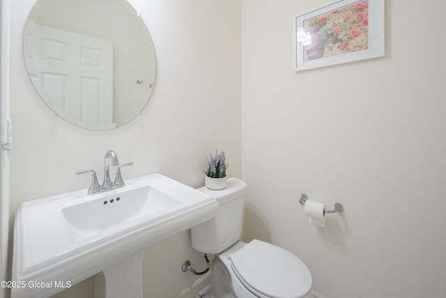 24 Utica Ave, Colonie, NY 12110 - bathroom with toilet and a sink