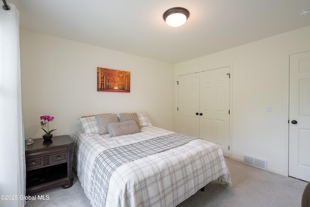 24 Utica Ave, Colonie, NY 12110 - bedroom featuring light carpet and a closet