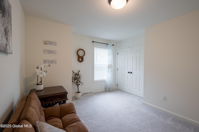 24 Utica Ave, Colonie, NY 12110 - living room with carpet floors and baseboards