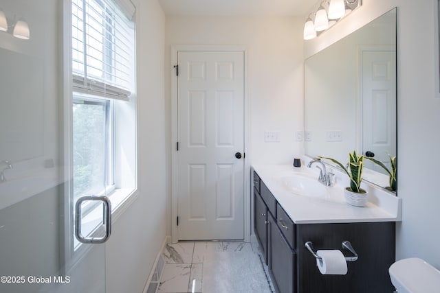 24 Utica Ave, Colonie, NY 12110 - full bath with vanity, marble look tiles, and a shower with shower door