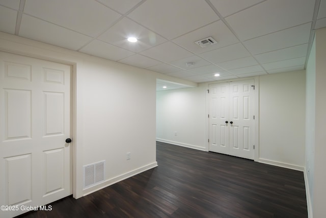 24 Utica Ave, Colonie, NY 12110 - finished below grade area featuring dark wood-style floors, recessed lighting, and a paneled ceiling