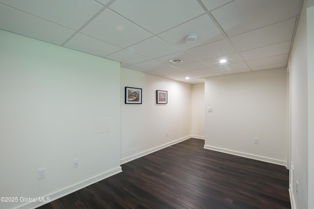 24 Utica Ave, Colonie, NY 12110 - unfurnished room featuring a drop ceiling, dark wood finished floors, recessed lighting, and a smoke detector
