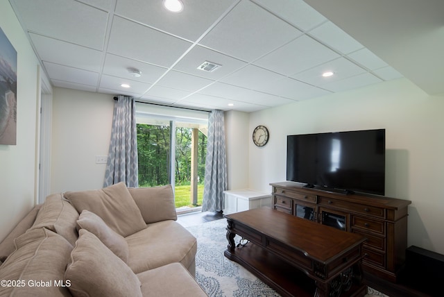 24 Utica Ave, Colonie, NY 12110 - living area featuring a paneled ceiling and recessed lighting
