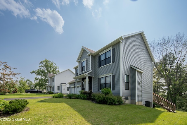 24 Utica Ave, Colonie, NY 12110 - view of property exterior featuring a yard and stairway