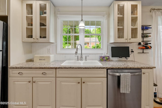 12 Glen Ter, Glenville, NY 12302 - kitchen with dishwasher, glass insert cabinets, light stone countertops, and decorative light fixtures