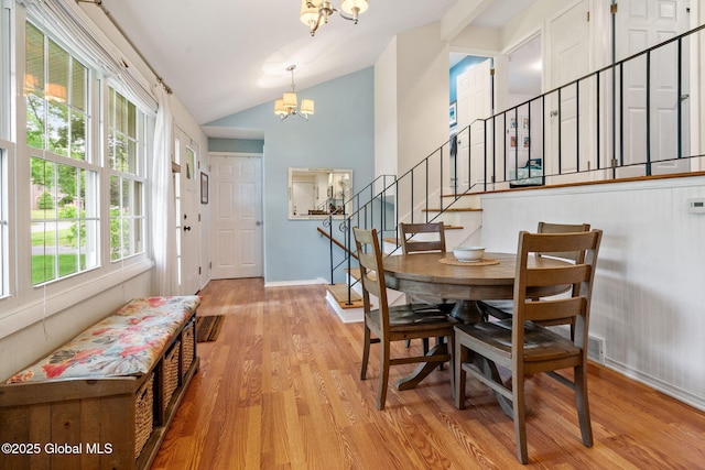 12 Glen Ter, Glenville, NY 12302 - dining area with a chandelier, lofted ceiling, wood finished floors, and stairway