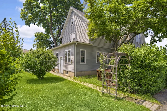 54 Wendell St, Ravena, NY 12143 - view of side of property featuring a lawn