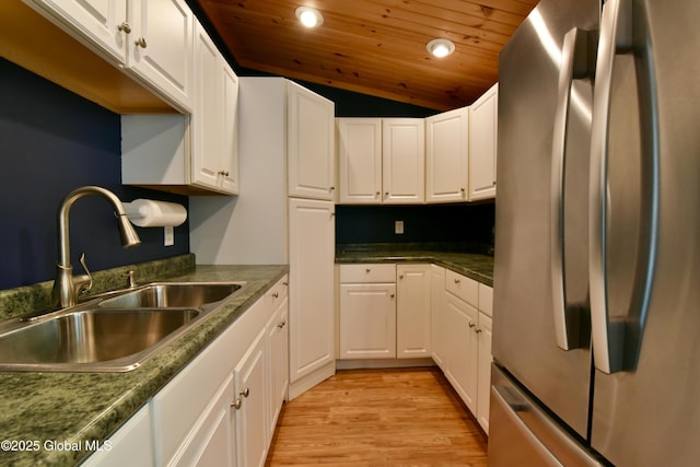 23 S Copeland Pond Way, Fort Ann, NY 12827 - kitchen with freestanding refrigerator, wood ceiling, recessed lighting, lofted ceiling, and white cabinets