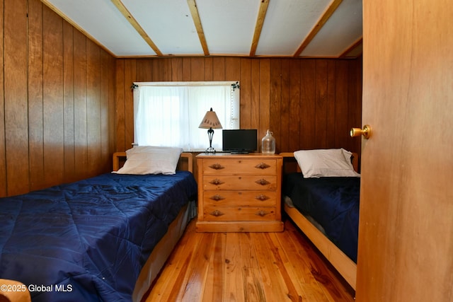 23 S Copeland Pond Way, Fort Ann, NY 12827 - bedroom featuring light wood finished floors and wood walls