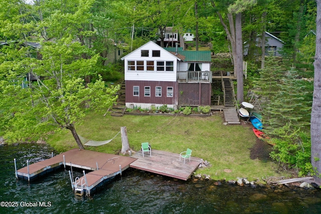 23 S Copeland Pond Way, Fort Ann, NY 12827 - back of house with stairs, a lawn, a deck with water view, and a metal roof