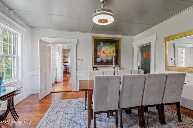 378 County Route 354, Rensselaerville, NY 12469 - dining room with light wood-style flooring and a wainscoted wall