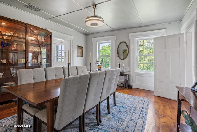 378 County Route 354, Rensselaerville, NY 12469 - dining room featuring hardwood / wood-style floors and a decorative wall