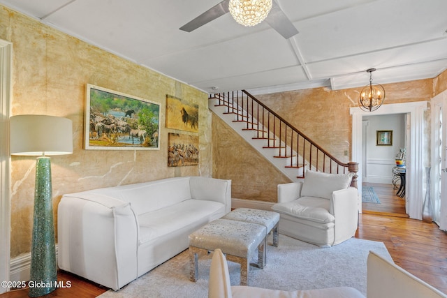378 County Route 354, Rensselaerville, NY 12469 - living room with hardwood / wood-style flooring, stairs, a chandelier, a ceiling fan, and coffered ceiling