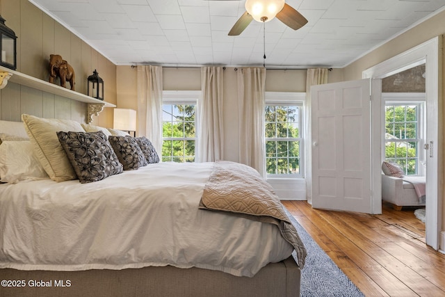 378 County Route 354, Rensselaerville, NY 12469 - bedroom featuring hardwood / wood-style floors, crown molding, and ceiling fan