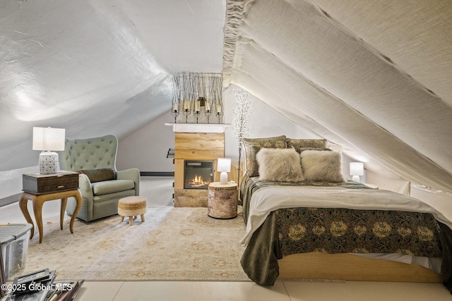 378 County Route 354, Rensselaerville, NY 12469 - bedroom with vaulted ceiling and a glass covered fireplace